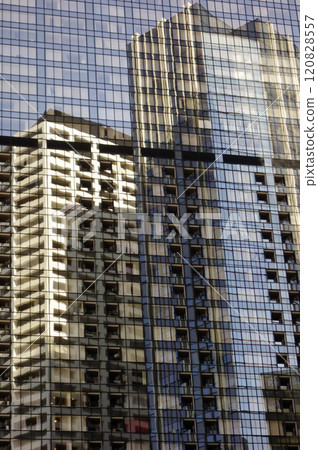 High-rise apartment building reflection in the windows of a high-rise building 120828557