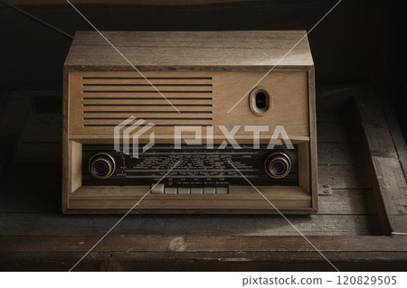 Vintage still life photo with an old wooden radio 120829505