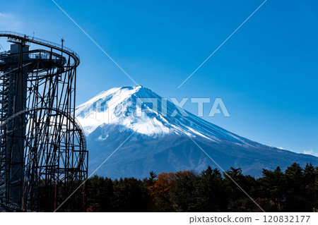 A roller coaster at an amusement park in Fujiyoshida, Yamanashi Prefecture, and Mount Fuji in winter A roller coaster at an amusement park in Fujiyoshida, Yamanashi Prefecture, and Mount Fuji in winter 120832177