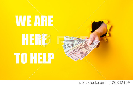 Hand is holding a bunch of money 120832309