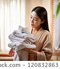 A woman with a towel 120832863