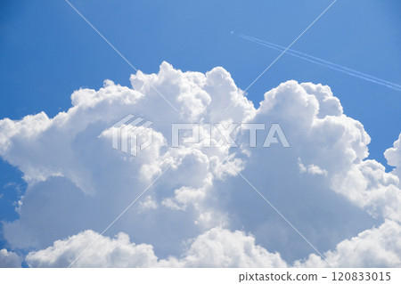 Summer clouds, blue sky and contrails 120833015
