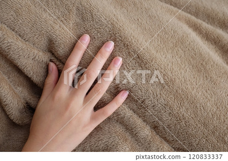 Blanket and girl's hands (elementary school student) 120833337