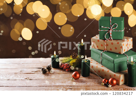 Christmas gift boxes with decoration on the table 120834217