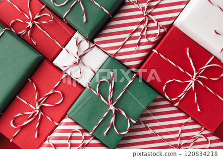 Color gift boxes on color background, flat lay 120834218