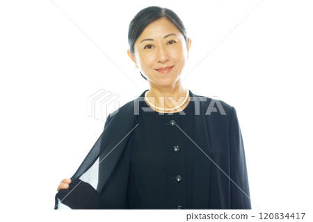 Middle-aged woman wearing summer mourning clothes 120834417