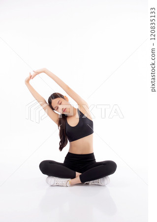 Portrait beautiful young asian woman in sportswear doing practice yoga for stretch hands and arm. 120835133