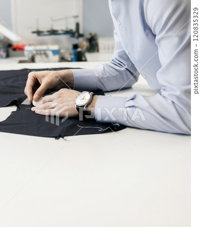 tailor using chalk tailor using chalk 120835329