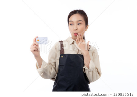 Portrait happiness young asian woman wearing apron holding credit card isolated. Portrait happiness young asian woman wearing apron holding credit card isolated. 120835512
