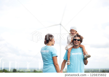 Family with daughter piggyback of father walking on nature. 120835602