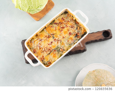 Baked squash and savoy cabbage casserole vegetarian lasagna Baked squash and savoy cabbage casserole vegetarian lasagna 120835636