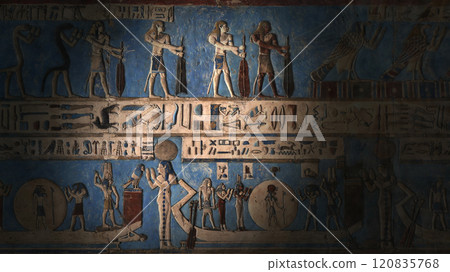 Hieroglyphic carvings and paintings on wall 120835768