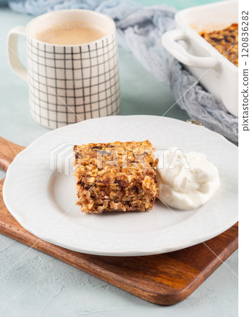 Baked oatmeal peanut butter porridge with chocolate chips 120836282