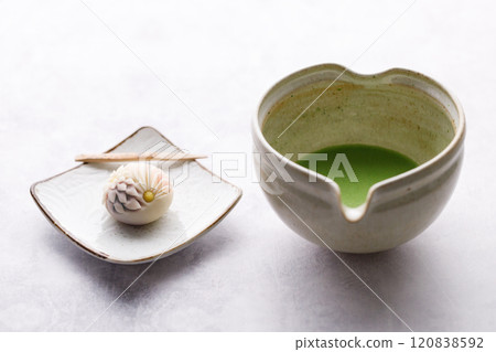a cup of mathca and japanese confectionery a cup of mathca and japanese confectionery 120838592