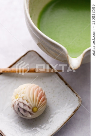 a cup of mathca and japanese confectionery a cup of mathca and japanese confectionery 120838599