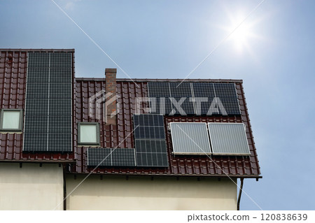 House Roof with Solar Panels Under Sunny Sky House Roof with Solar Panels Under Sunny Sky 120838639