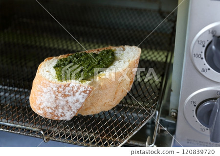 Basil bread: French bread with basil paste Basil bread: French bread with basil paste 120839720