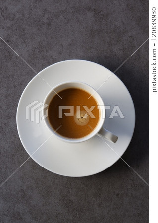 A top-down view of a mug of freshly brewed coffee 120839930
