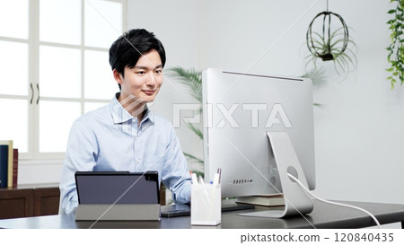 A man examining documents and resolving problems 120840435