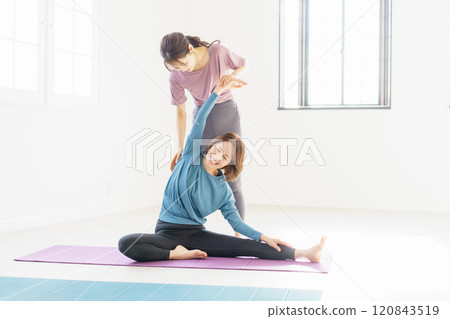 Young women and middle-aged women doing yoga Young women and middle-aged women doing yoga 120843519