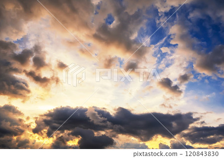 cloudy sky with clouds at sunset. Background of orange blue sky at sunrise cloudy sky with clouds at sunset. Background of orange blue sky at sunrise 120843830