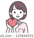 A female nurse holding a heart 120844059