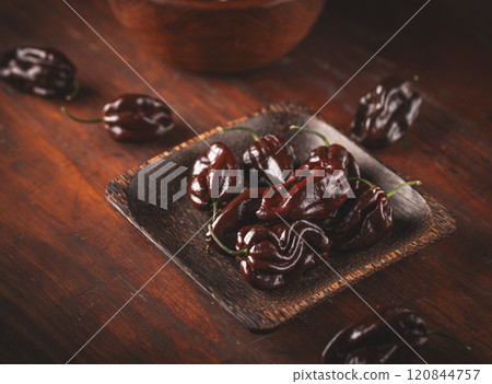 Chocolate habanero peppers 120844757