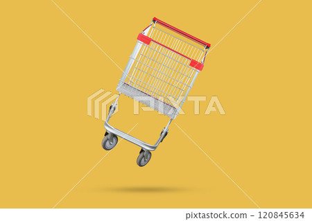 shopping cart isolated on yellow background 120845634