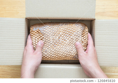 Eco friendly brown paper honeycomb wrap for product packaging parcel carton box Eco friendly brown paper honeycomb wrap for product packaging parcel carton box 120845810