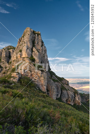 a majestic rock against the blue sky a majestic rock against the blue sky 120845952