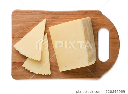 Cheese triangle pieces on a wooden board on a white background. Top view Cheese triangle pieces on a wooden board on a white background. Top view 120846069