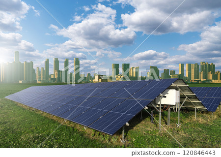 Solar panels on the field. Skyscrapers on the horizon. Eco city concept 120846443
