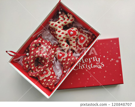 Festive Gift Box with Handmade Christmas Decorations 120848707
