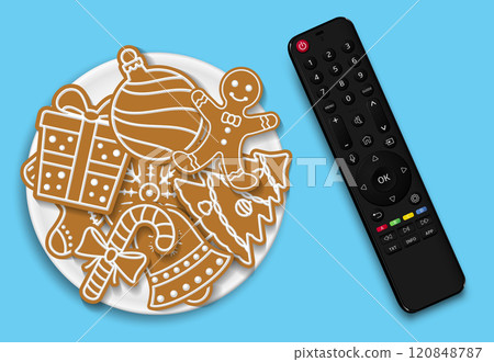 TV remote control and plate with tasty Christmas gingerbread cookies TV remote control and plate with tasty Christmas gingerbread cookies 120848787