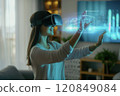 Woman Interacting with Augmented Reality Hologram 120849084