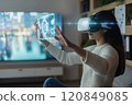Woman Using VR Headset with Augmented Reality Interface 120849085