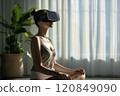 Calm female practice yoga in virtual reality online at home. 120849090