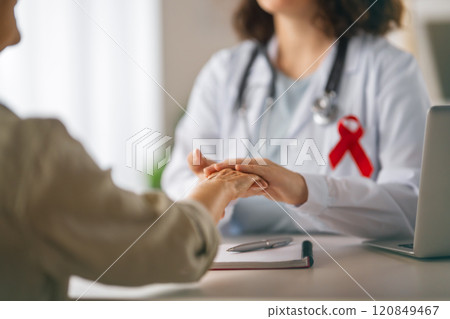 patient and a doctor in medical office 120849467