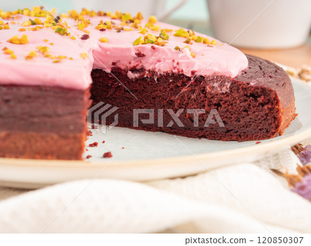 Beetroot chocolate cake with pink cream cheese pistachio icing Beetroot chocolate cake with pink cream cheese pistachio icing 120850307