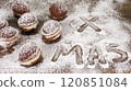 Delicious holiday treats decorated with powdered sugar for festive celebration 120851084