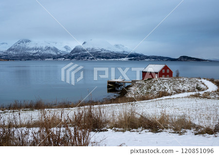 Seaside with a red house, Harstad, Norway 120851096