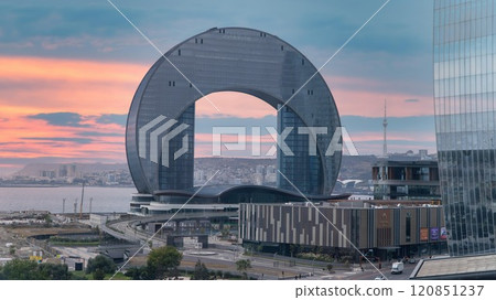 The Crescent Development Project against Baku's skyline, showcasing innovative architecture by the Caspian Sea in Azerbaijan vibrant capital. The Crescent Development Project against Baku's skyline, showcasing innovative architecture by the Caspian Sea in Azerbaijan vibrant capital. 120851237