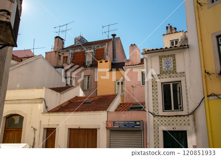 Lisbon, Portugal, facade of colorful old houses with windows, European historical buildings, cozy cityscape, Portuguese streets landscape Lisbon, Portugal, facade of colorful old houses with windows, European historical buildings, cozy cityscape, Portuguese streets landscape 120851933