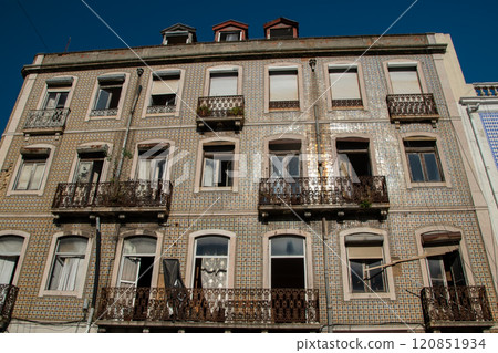 Lisbon, Portugal, facade of colorful old houses with windows, European historical buildings, cozy cityscape, Portuguese streets landscape 120851934