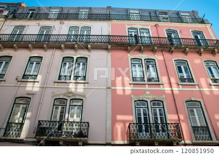 Lisbon, Portugal, facade of colorful old houses with windows, European historical buildings, cozy cityscape, Portuguese streets landscape Lisbon, Portugal, facade of colorful old houses with windows, European historical buildings, cozy cityscape, Portuguese streets landscape 120851950