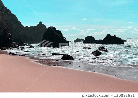 Empty wild sandy beach, Atlantic Ocean seascape, sea waves, beautiful cloudscape, dramatic landscape, travel content, Lisbon, Portugal 120852651