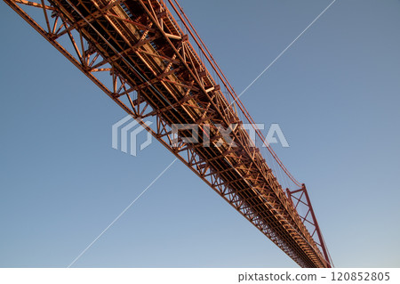 Lisbon, Portugal, Ponte 25 de Abril Bridge metal structure, modern architecture 120852805