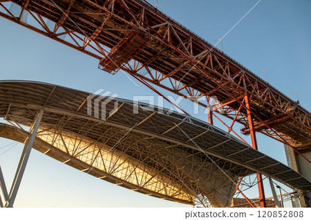 Lisbon, Portugal, Ponte 25 de Abril Bridge metal structure, modern architecture 120852808