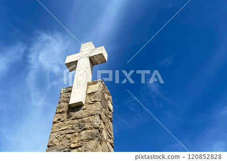 Large stone cross against the blue sky, Cape Da Roca, Cabo da Roca, Portugal 120852828