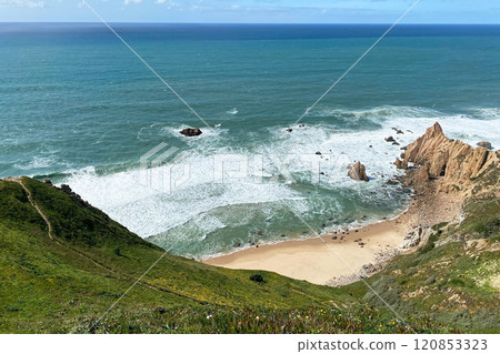 Panorama of the ocean coast and rock bay, Atlantic Ocean, beautiful cloudscape, dramatic landscape, colorful seascape with sheer rocks, travel content, Lisbon, Portugal 120853323